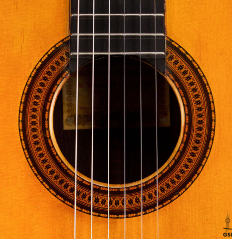The rosette of a 1965 Hernandez y Aguado classical guitar made with spruce and Indian rosewood