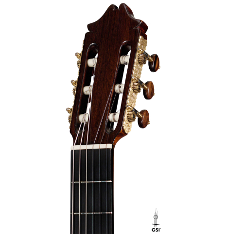 The headstock and tuners of a 1965 Hernandez y Aguado classical guitar made with spruce and Indian rosewood