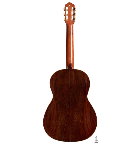 The back of a 1918 Santos Hernandez classical guitar made with spruce and csa rosewood on a white background