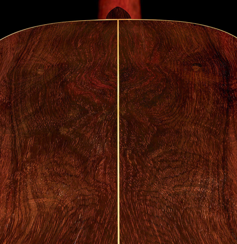 The close-up of the back of a 1918 Santos Hernandez classical guitar made with spruce and csa rosewood