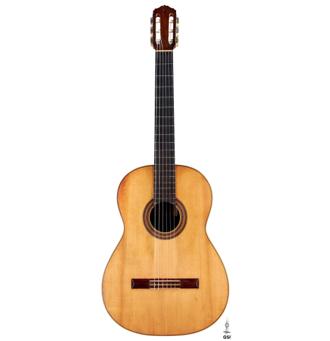 The front of a 1918 Santos Hernandez classical guitar made with spruce and csa rosewood on a white background