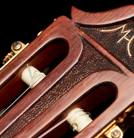 The ornamented headstock of a 1974 Hernandez y Aguado classical guitar made of spruce and CSA rosewood