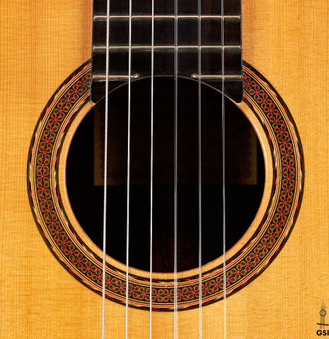 The rosette of a 1974 Hernandez y Aguado classical guitar made of spruce and CSA rosewood