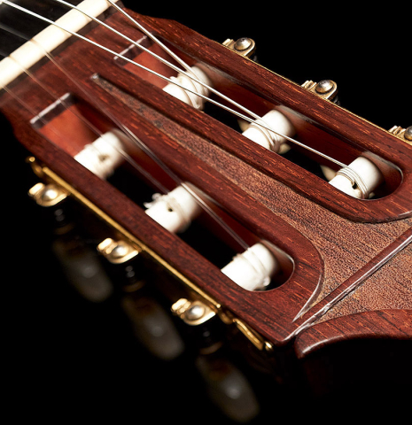 The ornamented headstock of a 1973 Hernandez y Aguado classical guitar made of cedar and CSA rosewood