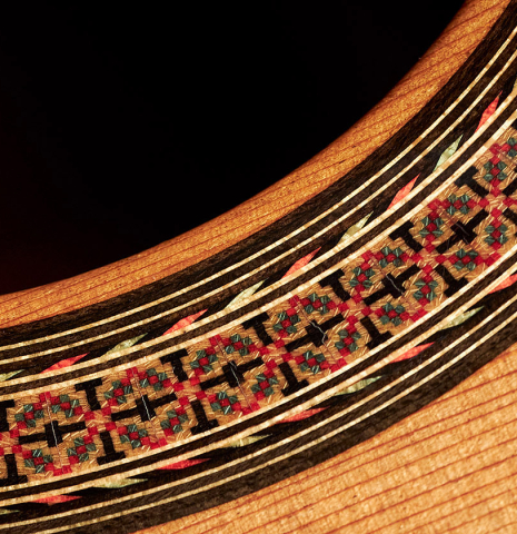 A close-up of the rosette of a 1973 Hernandez y Aguado classical guitar made of cedar and CSA rosewood