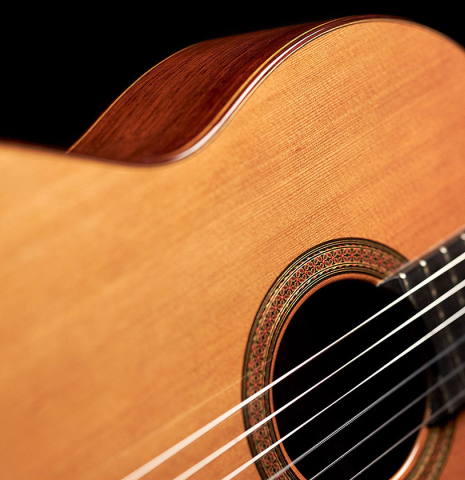 The soundboard of a 1973 Hernandez y Aguado classical guitar made of cedar and CSA rosewood