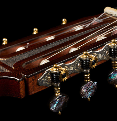 The headstock and tuners of a 1964 Hernandez y Aguado classical guitar made of spruce and CSA rosewood