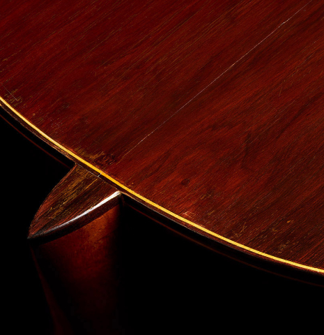 The heel and back binding of a 1964 Hernandez y Aguado classical guitar made of spruce and CSA rosewood