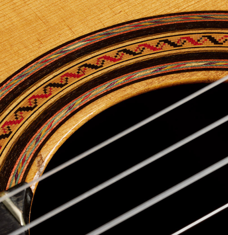 Detailed closeup of the rosette of a 1931 Santos Hernandez classical guitar made of spruce and CSA rosewood (ex David Gómez Tárrega)