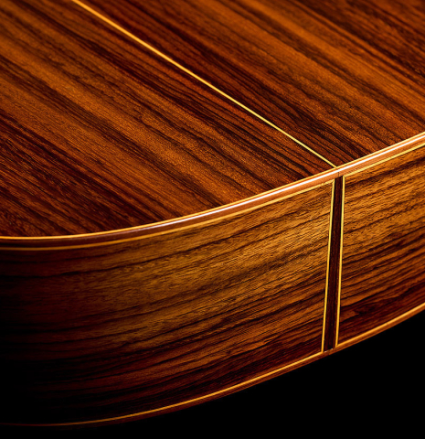 The back and sides at the foot of a 1941 Santos Hernandez classical guitar made of spruce and CSA rosewood