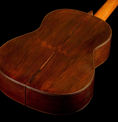 The back and sides of a 1970 Hernández y Aguado classical guitar made of cedar and CSA rosewood