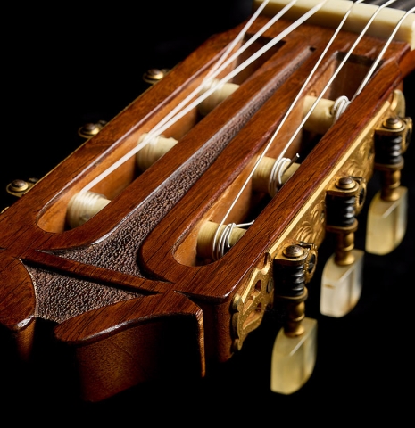 The famous "carved" headstock of a 1970 Hernández y Aguado classical guitar made of cedar and CSA rosewood
