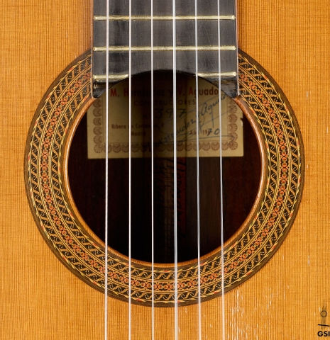 The rosette of a 1970 Hernández y Aguado classical guitar made of cedar and CSA rosewood