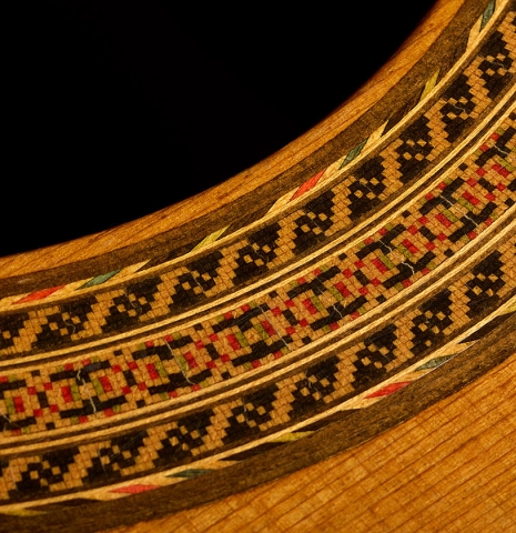Close up detail of the rosette of a 1970 Hernández y Aguado classical guitar made of cedar and CSA rosewood