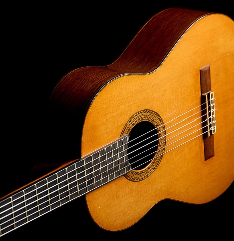 The sounboard and fingerboard of a 1970 Hernández y Aguado classical guitar made of cedar and CSA rosewood