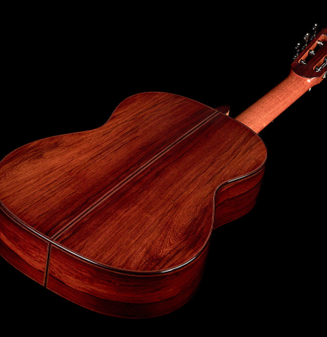 The back and sides of a 2022 Dietmar Heubner classical guitar made with spruce and African rosewood