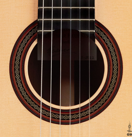The rosette of a 2022 Dietmar Heubner classical guitar made with spruce and African rosewood