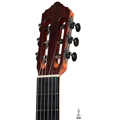 The headstock and tuners of a 2022 Dietmar Heubner classical guitar made with spruce and African rosewood