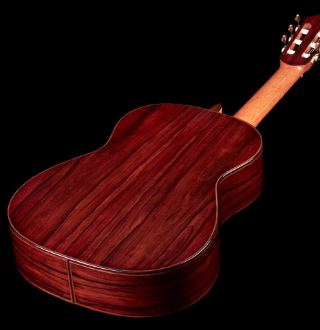 The back and sides of a 2023 Dietmar Heubner classical guitar made with spruce and African rosewood