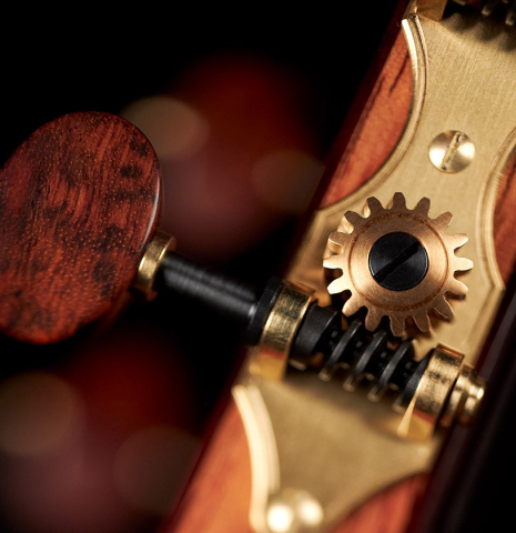 The headstock and tuners of a 2023 Dietmar Heubner classical guitar made with spruce and African rosewood