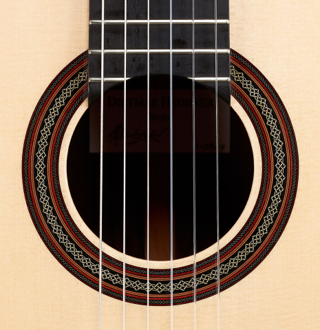 The rosette of a 2024 Dietmar Heubner "Bois de Rose" classical guitar made with spruce and African rosewood