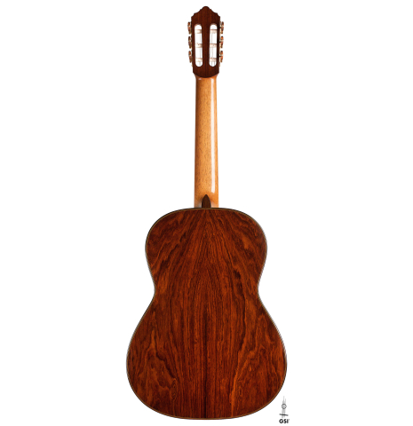 The back of a 2021 Dietmar Heubner classical guitar made of spruce and cocobolo on a white background.