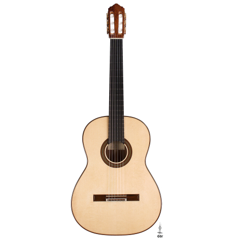 The front of a 2021 Dietmar Heubner classical guitar made of spruce and cocobolo on a white background.
