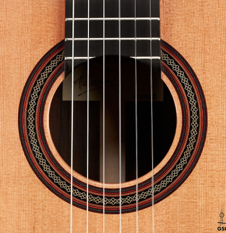 The rosette of a 2022 Dietmar Heubner classical guitar made with cedar and African rosewood