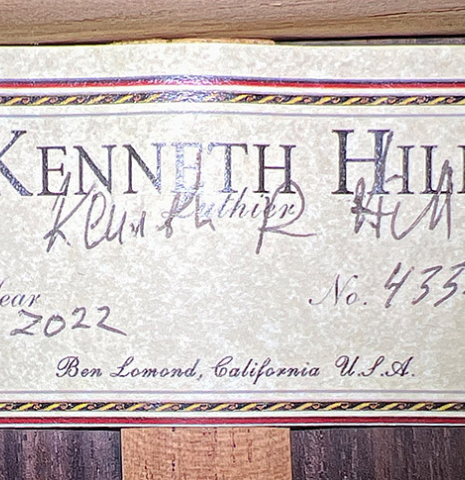 This is the label of a 2022 Kenny Hill "Signature SP/CD" SP/IN classical guitar