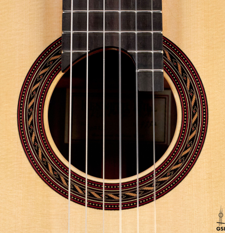 This is the rosette of a 2022 Kenny Hill "Signature SP/CD" SP/IN classical guitar