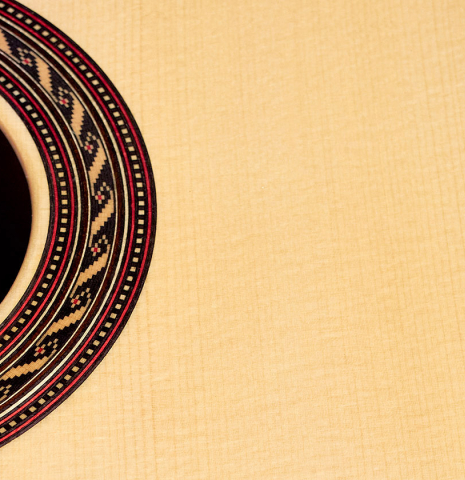 This is the spruce top front of a 2022 Kenny Hill "Signature SP/CD" SP/IN classical guitar