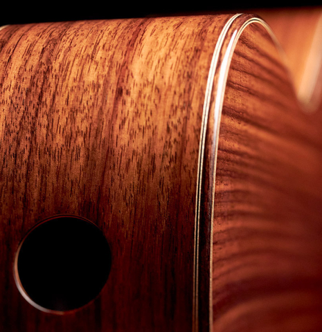 This is the back and side showing sound port of a 2022 Kenny Hill "Signature SP/CD" SP/IN classical guitar