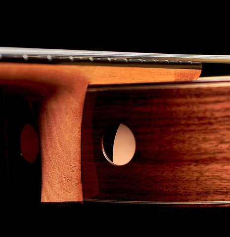 This is the side and sound port of a 2022 Kenny Hill "Signature SP/CD" SP/IN classical guitar