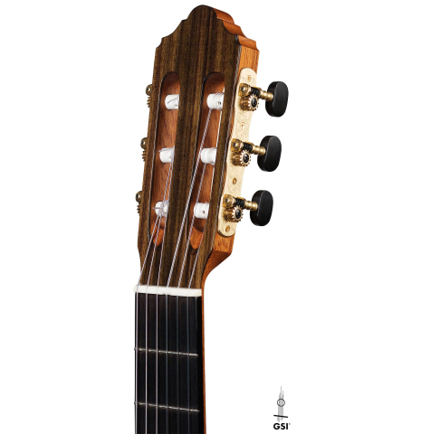 The headstock of a 2016 Kenny Hill "Performance" classical guitar made of spruce and Indian rosewood