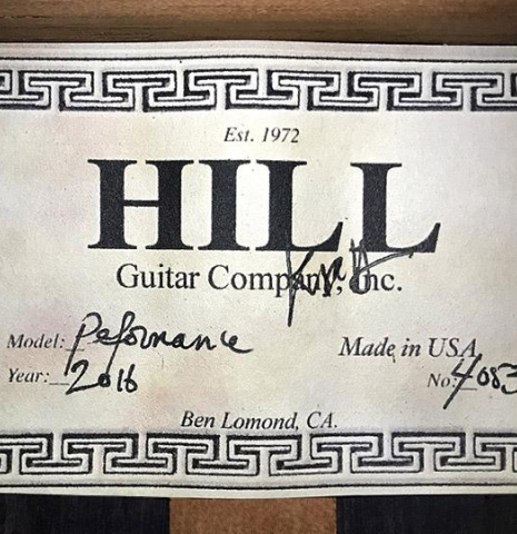 The label of a 2016 Kenny Hill "Performance" classical guitar made of spruce and Indian rosewood