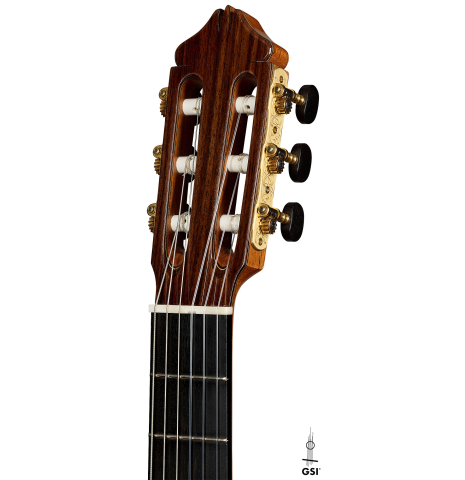 The headstock of a 2025 Kenny Hill "New Century CD/SP" classical guitar made of a cedar/spruce double-top and Indian rosewood back and sides