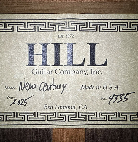 The label of a 2025 Kenny Hill "New Century CD/SP" classical guitar made of a cedar/spruce double-top and Indian rosewood back and sides