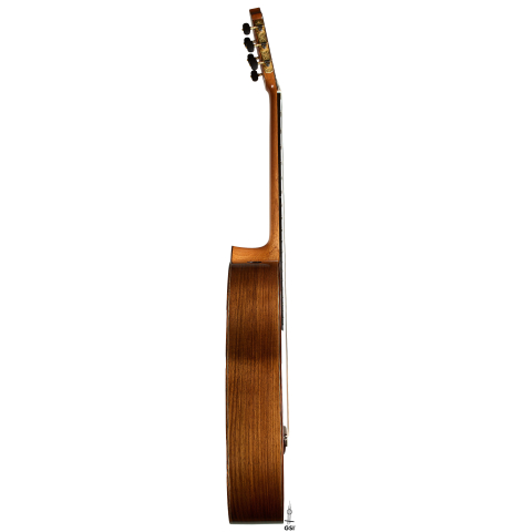 The side of a 2025 Kenny Hill "New Century CD/SP" classical guitar made of a cedar/spruce double-top and Indian rosewood back and sides