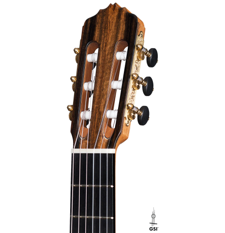 The headstock and machine heads of a 2021 Stephen Hill classical guitar made with cedar and exotic ebony