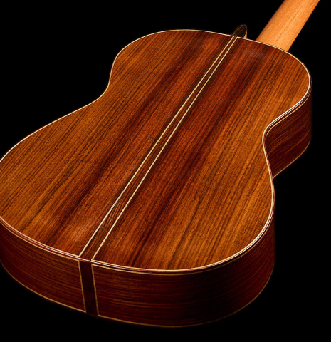 The back and sides of a 2025 Kenny Hill "Signature CD/SP" classical guitar made of a cedar/spruce double top and Indian rosewood