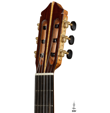 The headstock of a 2025 Kenny Hill "Signature CD/SP" classical guitar made of a cedar/spruce double top and Indian rosewood