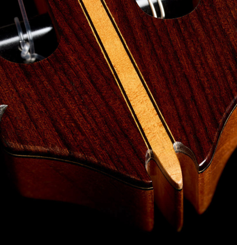 The headstock veneer with inlay of a 2025 Kenny Hill "Signature CD/SP" classical guitar made of a cedar/spruce double top and Indian rosewood