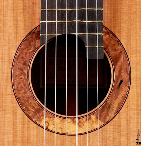 The rosette of a 2022 Kenny Hill “Signature Legacy 640 CD/SP” CD/IN classical guitar on a white background