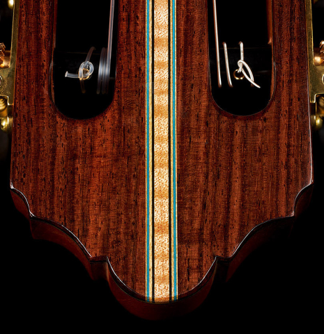 The head veener with purflings of a 2020 Kenny Hill "Heritage" classical guitar made of cedar and Indian rosewood