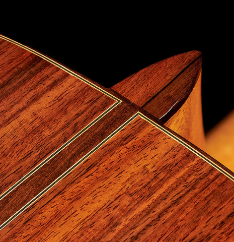 The heel, back and center seam of a 2020 Kenny Hill "Heritage" classical guitar made of cedar and Indian rosewood