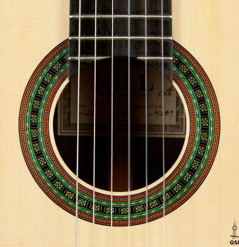 The rosette of a 2021 Kenny Hill "Torres 640" classical guitar made of spruce and CSA rosewood