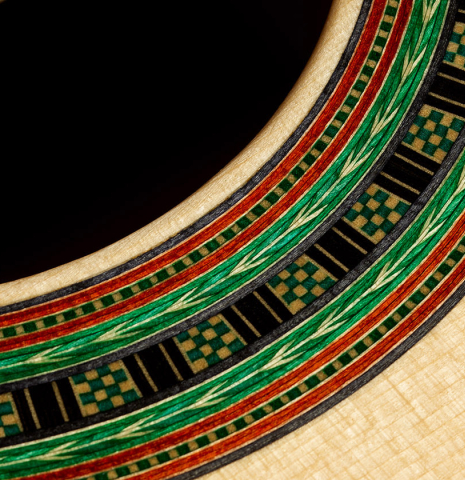 Close-up detail of the rosette of a 2021 Kenny Hill "Torres 640" classical guitar made of spruce and CSA rosewood