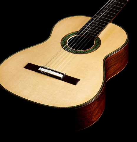The soundboard of a 2021 Kenny Hill "Torres 640" classical guitar made of spruce and CSA rosewood