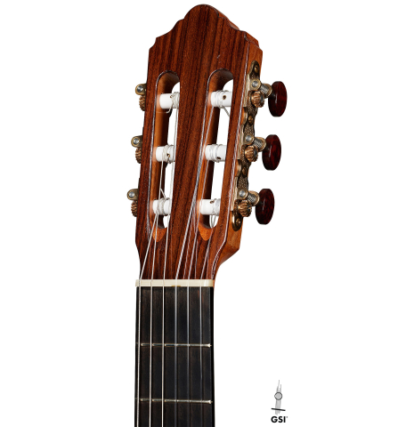The headstock of a 2015 Kenny Hill "Performance 640 SP/CD" classical guitar made of spruce and maple