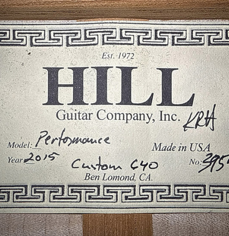 The label of a 2015 Kenny Hill "Performance 640 SP/CD" classical guitar made of spruce and maple